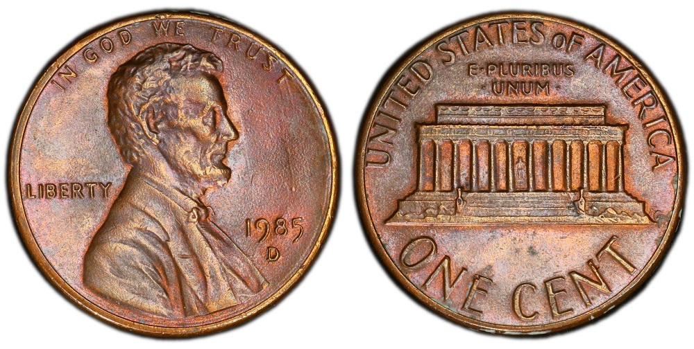 1985 penny grading strip showing four condition tiers from worn to gem mint state